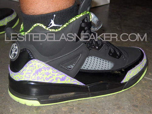  lime green/purple colorway. Set against a black 