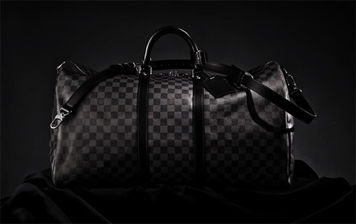 The luxurious Damier Graphite pattern adds a touch of