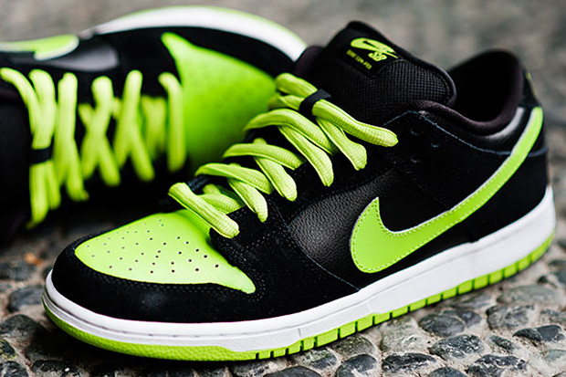 neon green and black shoes