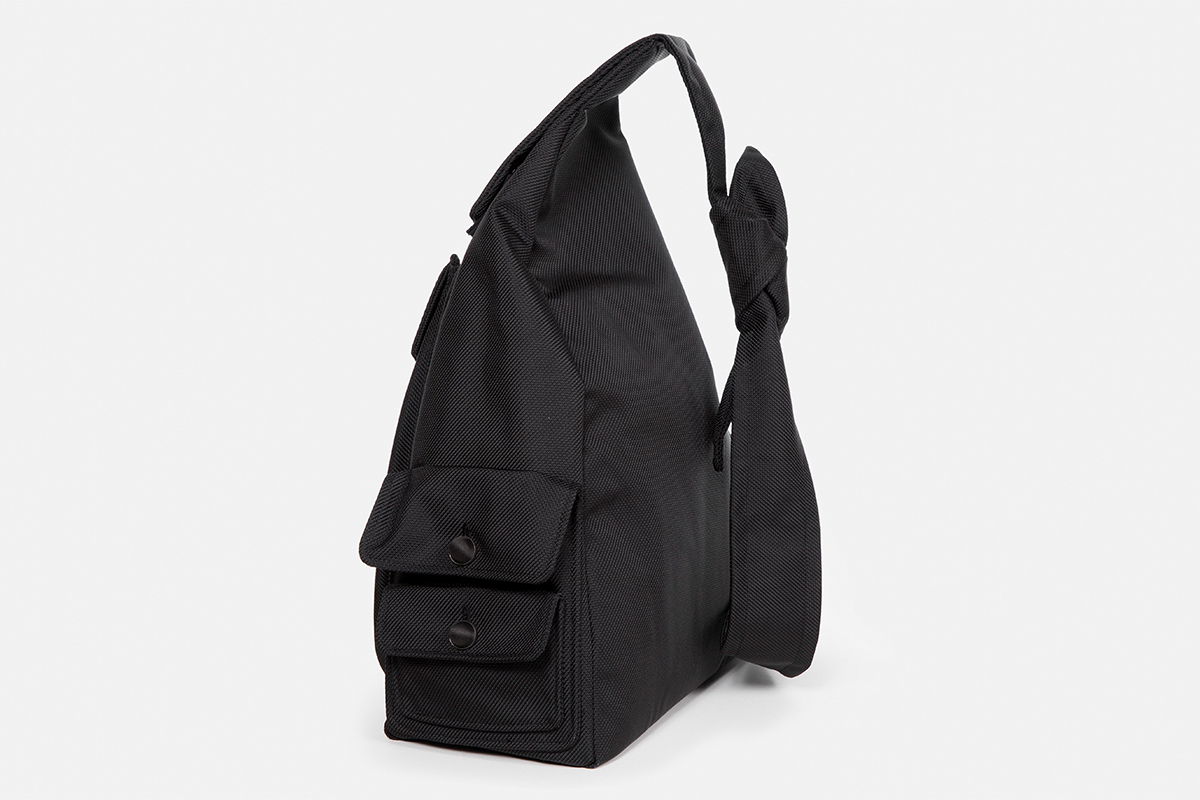 Eastpak Raf Simons Sleek Sling Backpack In Black