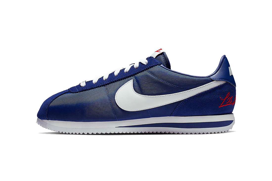 white and blue nike cortez