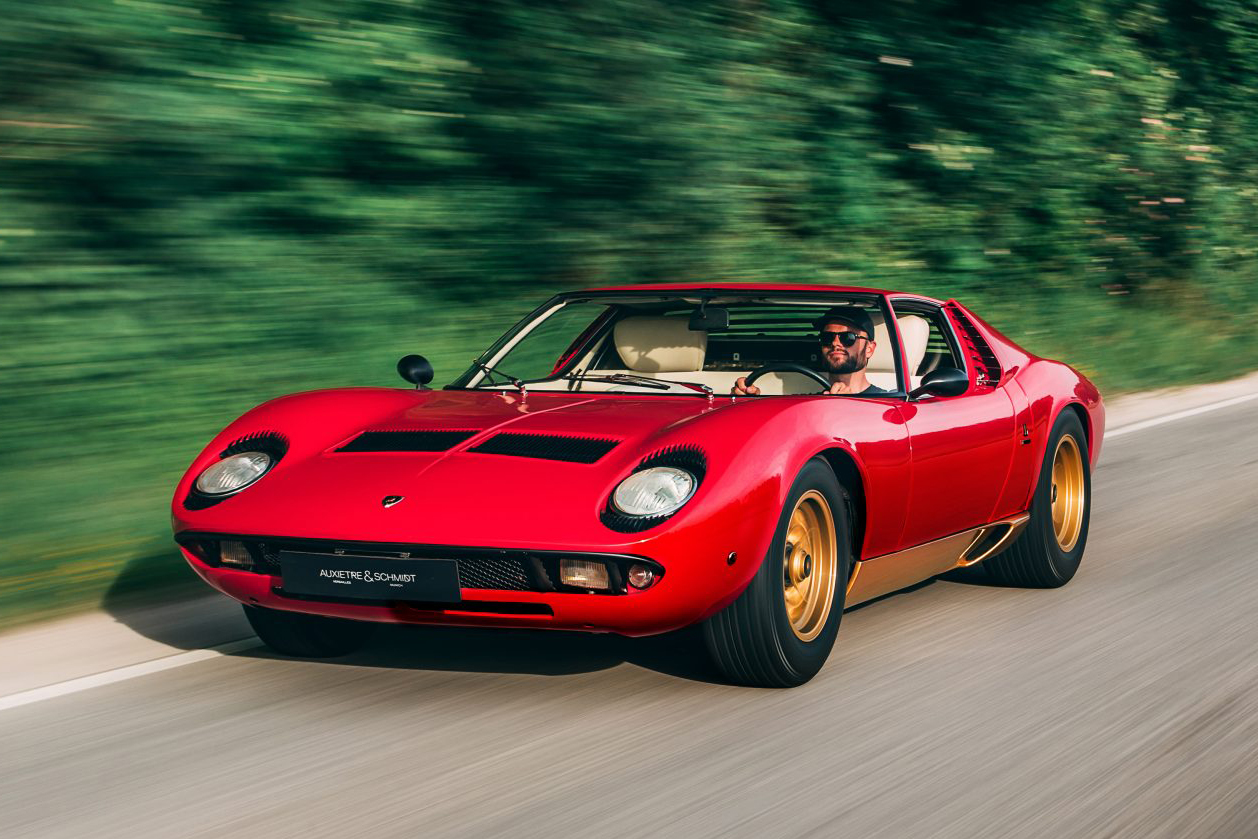 https://hypebeast.com/image/2020/05/1968-lamborghini-miura-p400-for-sale-red-gold-closer-look-italian-supercar-classic-1.jpg