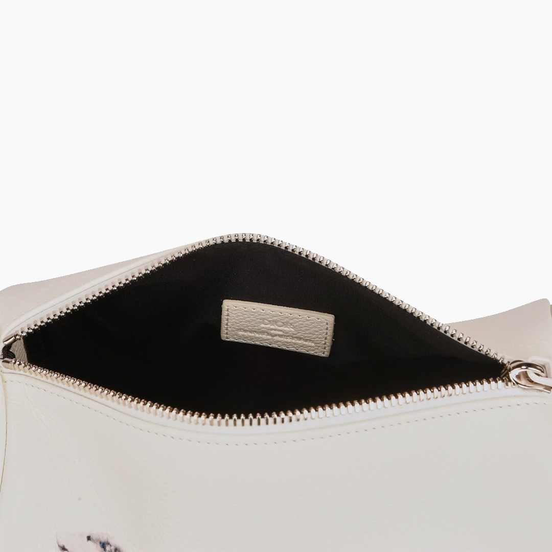 Daniel Arsham x Dior Grained Leather Roller Bag | Drops | Hypebeast